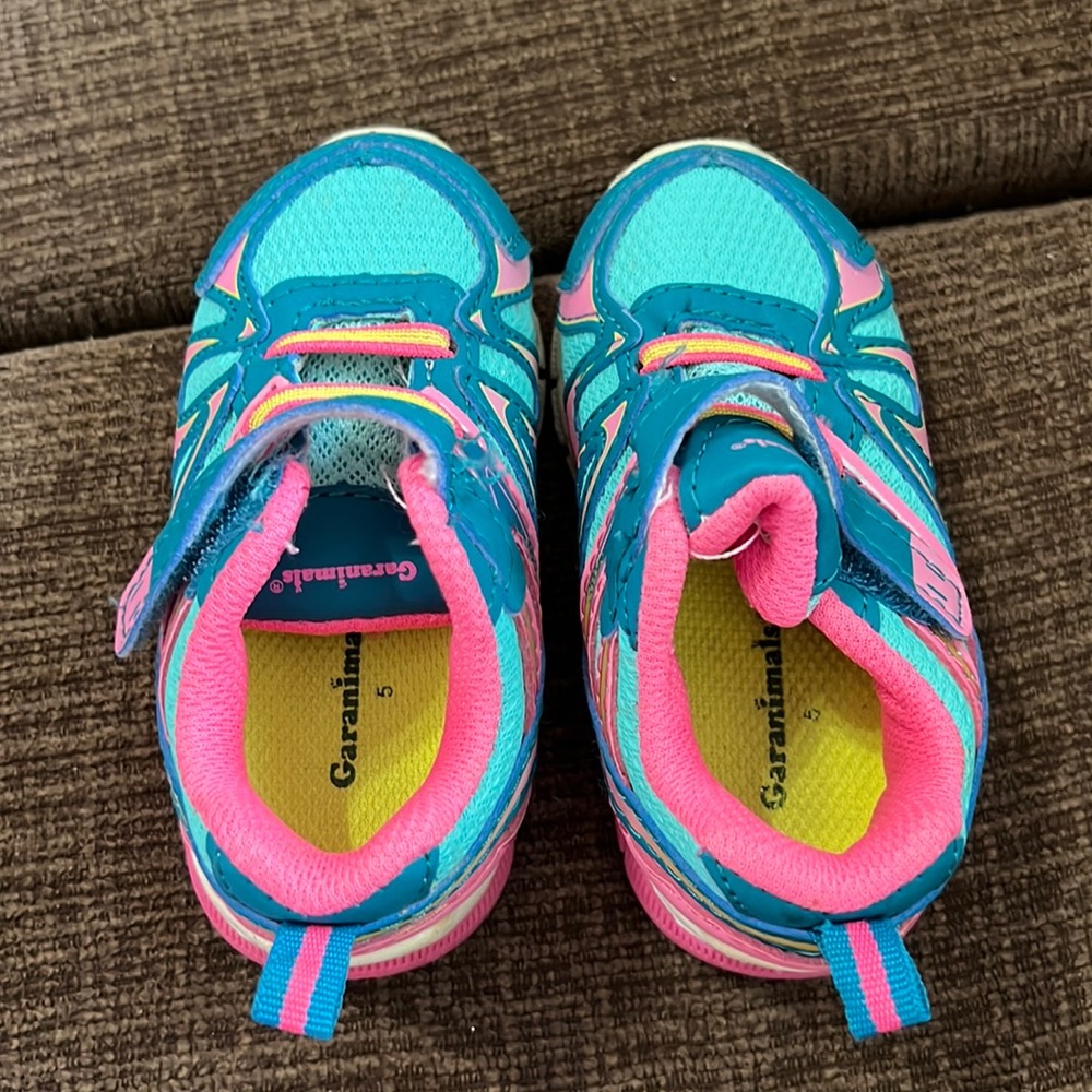 Infant size 5 multi color tennis shoes. Gently worn
